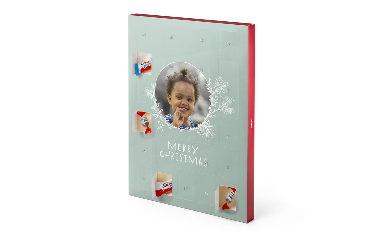 Vårfotobok med mønstret omslag og teksten "MERRY CHRISTMAS".